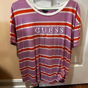 This is a Guess brand oversized short sleeved shirt in size large